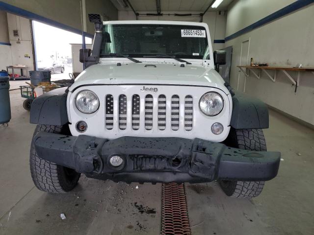 Photo 5 from auction – 2014 JEEP WRANGLER U with VIN 1C4BJWDG6EL311275