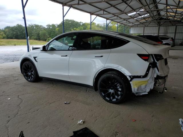 Photo 2 from auction – 2023 TESLA MODEL Y with VIN 7SAYGDEE2PF676023