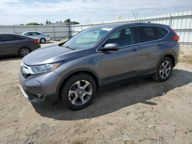 HONDA CR-V EX 2018 with VIN 7FARW1H53JE019158 - Photo from auction