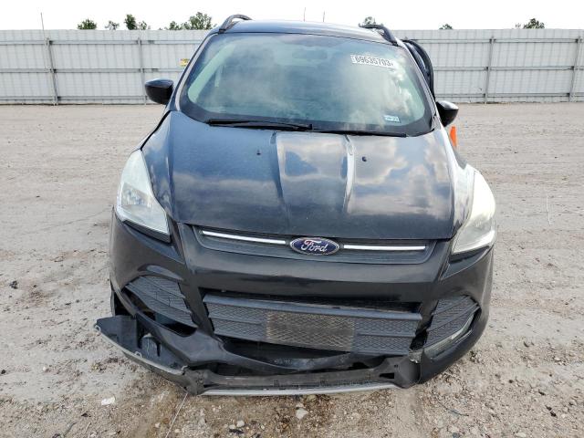 Photo 5 from auction – 2014 FORD ESCAPE SE with VIN 1FMCU9G97EUD75213