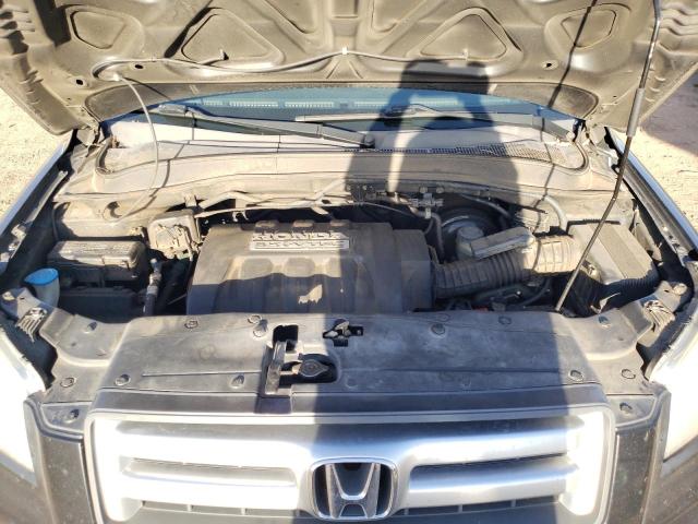 Photo 11 from auction – 2006 HONDA PILOT EX with VIN 5FNYF28506B007473