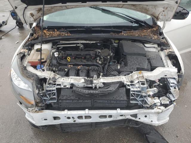 Photo 11 from auction – 2014 FORD FOCUS TITA with VIN 1FADP3N28EL460883