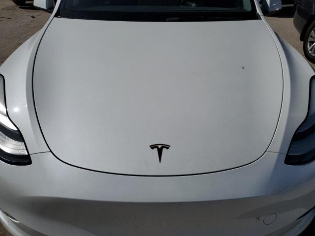 Photo 11 from auction – 2021 TESLA MODEL Y with VIN 5YJYGDEE9MF148181