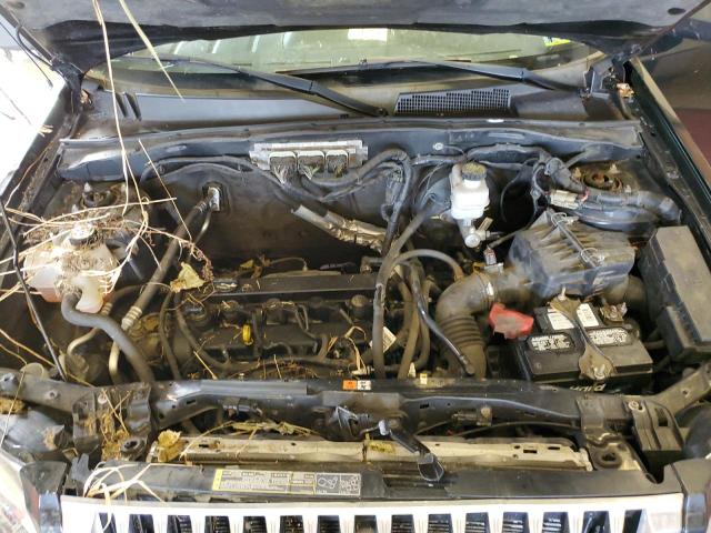 Photo 12 from auction – 2011 MERCURY MARINER with VIN 4M2CN9B70BKJ01635