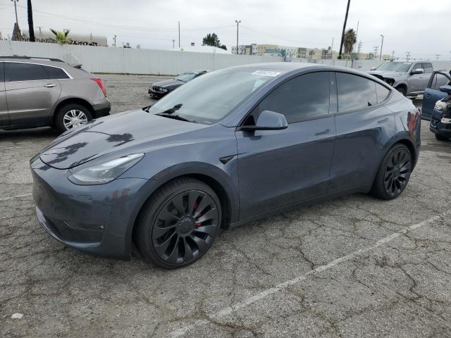 TESLA MODEL Y 2023 with VIN 7SAYGDEF8PF801888 - Photo from auction