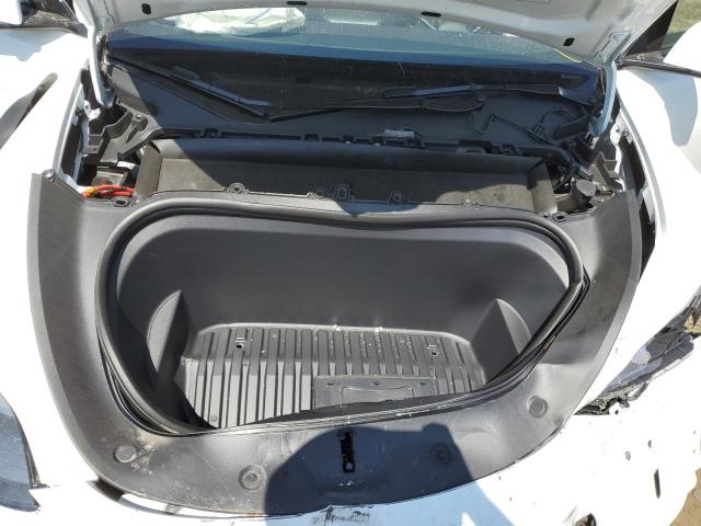Photo 11 from auction – 2022 TESLA MODEL Y with VIN 7SAYGDEE7NF560507