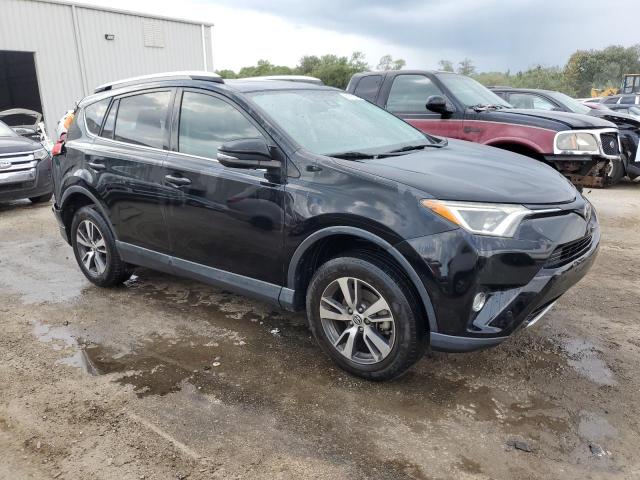 Photo 4 from auction – 2016 TOYOTA RAV4 XLE with VIN 2T3WFREV6GW287674