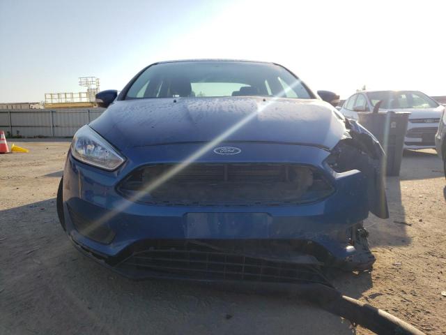 Photo 5 from auction – 2018 FORD FOCUS SE with VIN 1FADP3F23JL259644
