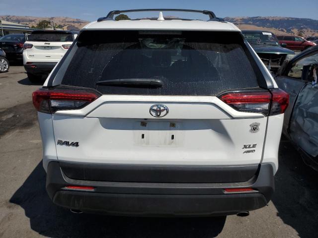 Photo 6 from auction – 2020 TOYOTA RAV4 XLE with VIN JTMP1RFV0LD063468