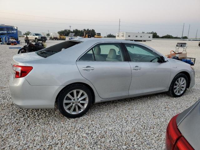 Photo 3 from auction – 2012 TOYOTA CAMRY HYBR with VIN 4T1BD1FK9CU027461