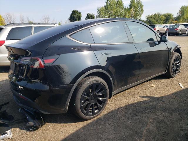 Photo 3 from auction – 2022 TESLA MODEL Y with VIN 7SAYGDEEXNF574711