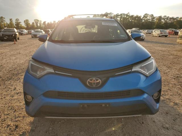 Photo 5 from auction – 2017 TOYOTA RAV4 XLE with VIN JTMWFREV7HJ704977