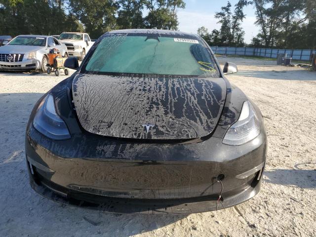 Photo 5 from auction – 2022 TESLA MODEL 3 with VIN 5YJ3E1EC2NF311686