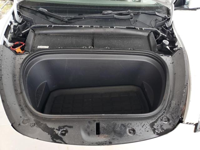 Photo 11 from auction – 2023 TESLA MODEL Y with VIN 7SAYGDEE6PF611904