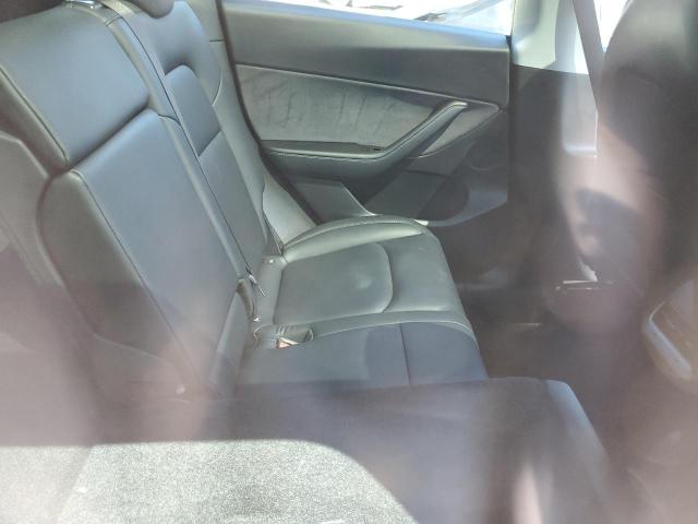 Photo 11 from auction – 2021 TESLA MODEL Y with VIN 5YJYGDEDXMF105508