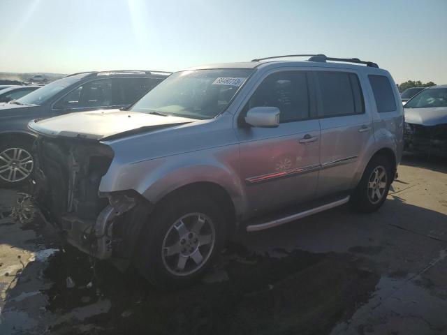 HONDA PILOT TOUR 2010 with VIN 5FNYF3H95AB023363 - Photo from auction