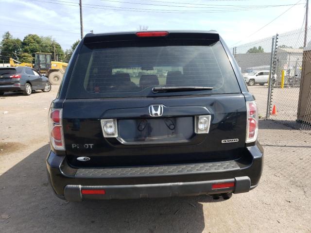 Photo 6 from auction – 2006 HONDA PILOT LX with VIN 2HKYF18176H534841