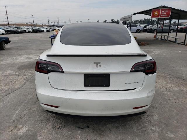 Photo 6 from auction – 2021 TESLA MODEL 3 with VIN 5YJ3E1EB4MF004347