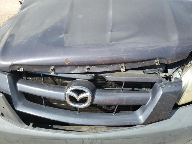 Photo 12 from auction – 2006 MAZDA TRIBUTE I with VIN 4F2YZ02Z46KM25612