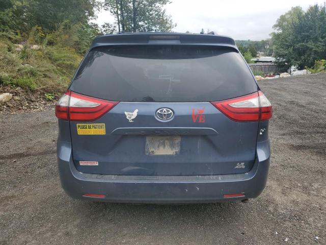 Photo 6 from auction – 2015 TOYOTA SIENNA LE with VIN 5TDJK3DC2FS111529