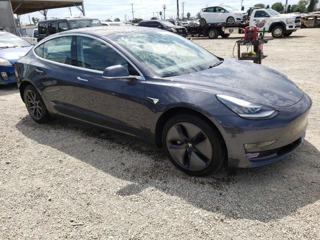 Снимка 4 от търг – 2018 TESLA MODEL 3 с VIN 5YJ3E1EA1JF123878