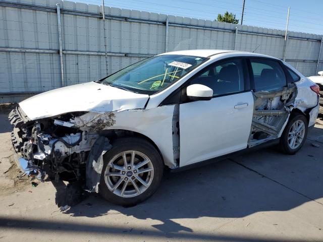FORD FOCUS SE 2018 with VIN 1FADP3FE7JL241609 - Photo from auction