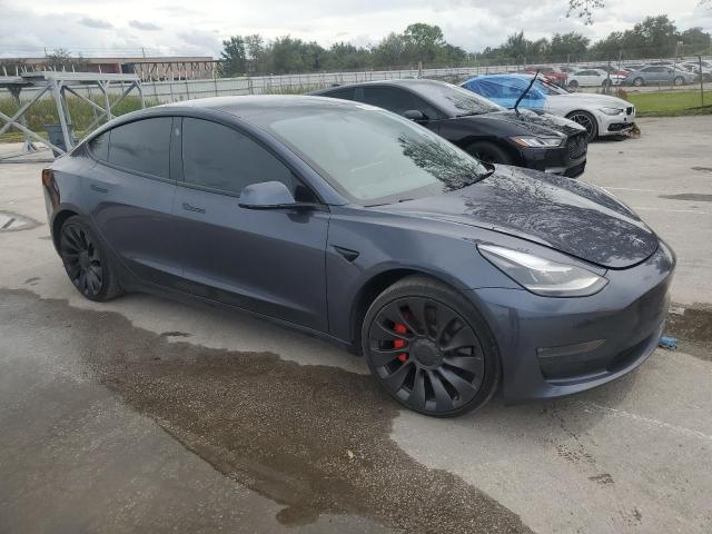 Photo 4 from auction – 2022 TESLA MODEL 3 with VIN 5YJ3E1EC9NF119939