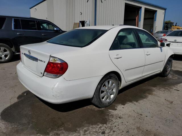 Photo 3 from auction – 2002 TOYOTA CAMRY LE with VIN JTDBF30K320005075