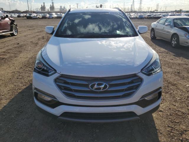 Photo 5 from auction – 2017 HYUNDAI SANTA FE S with VIN 5NMZU3LB5HH013722