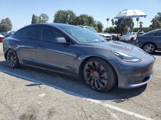 Снимка 4 от търг – 2022 TESLA MODEL 3 с VIN 5YJ3E1ECXNF298802