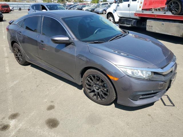 Photo 4 from auction – 2018 HONDA CIVIC LX with VIN 19XFC2E50JE011963