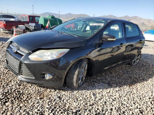 FORD FOCUS SE 2014 con VIN 1FADP3F29EL325118 - Foto de la subasta