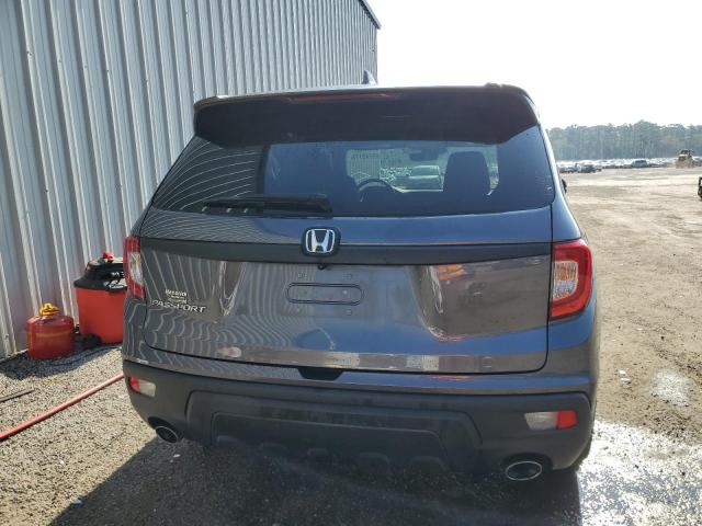 Photo 6 from auction – 2021 HONDA PASSPORT E with VIN 5FNYF7H55MB012632