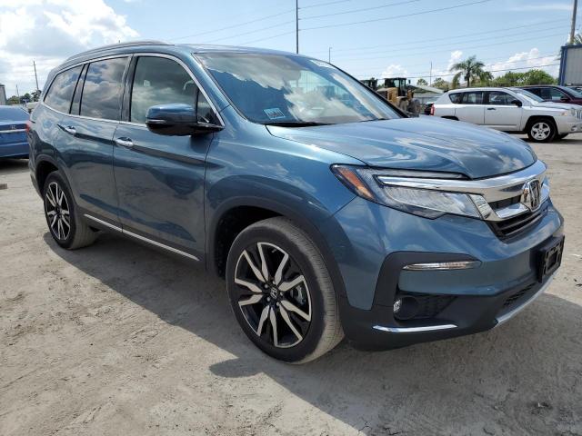 Photo 4 from auction – 2021 HONDA PILOT ELIT with VIN 5FNYF6H05MB084350