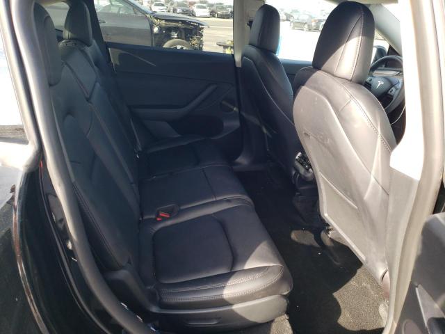 Photo 10 from auction – 2022 TESLA MODEL Y with VIN 7SAYGAEE9NF558448