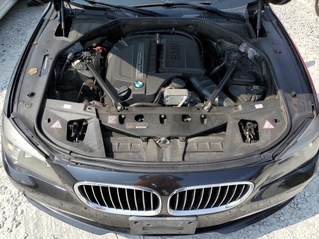 Photo 11 from auction – 2015 BMW 740 LXI with VIN WBAYF4C51FGS99317