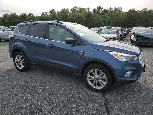 Photo 4 from auction – 2018 FORD ESCAPE SE with VIN 1FMCU9GD1JUC83612
