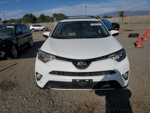 Photo 5 from auction – 2017 TOYOTA RAV4 XLE with VIN 2T3WFREV0HW376027