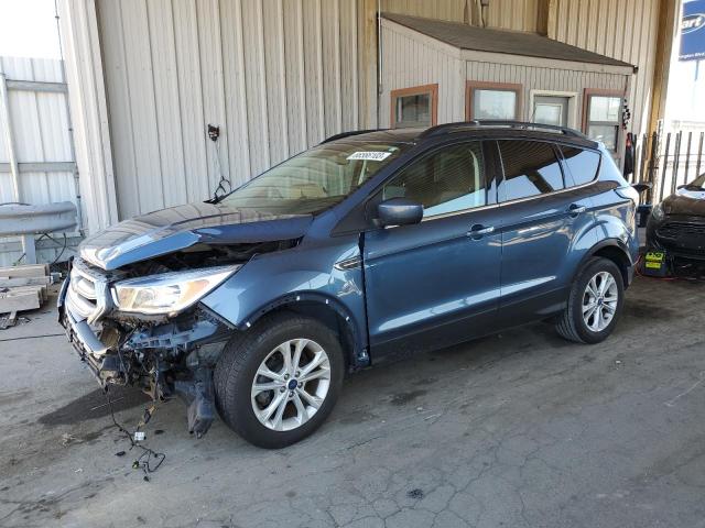 FORD ESCAPE SE 2018 with VIN 1FMCU0GD2JUC69424 - Photo from auction