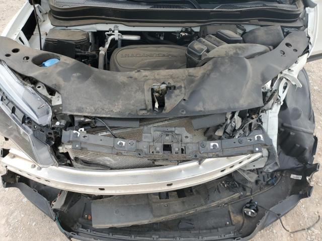 Photo 11 from auction – 2021 HONDA PILOT EXL with VIN 5FNYF5H50MB044053