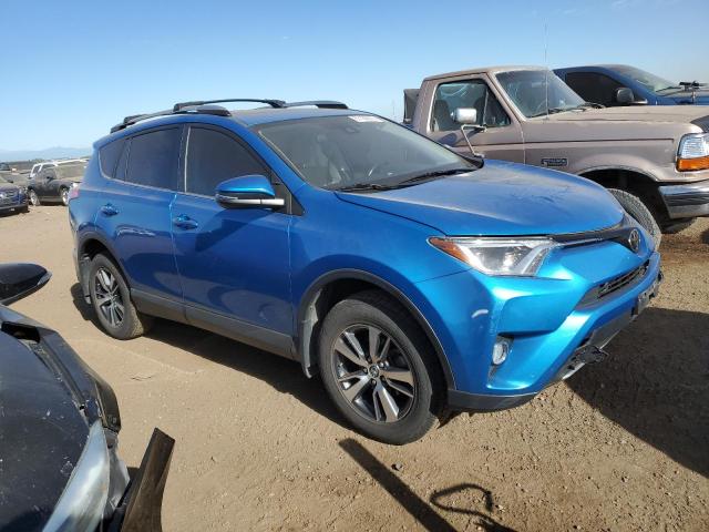 Photo 4 from auction – 2017 TOYOTA RAV4 XLE with VIN JTMRFREV7HD221646