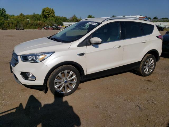 FORD ESCAPE TIT 2017 with VIN 1FMCU0JD4HUC08319 - Photo from auction
