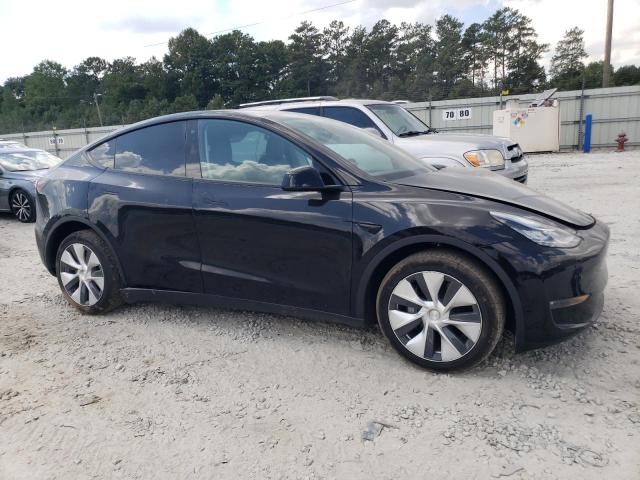 Photo 4 from auction – 2022 TESLA MODEL Y with VIN 7SAYGDEEXNF318083