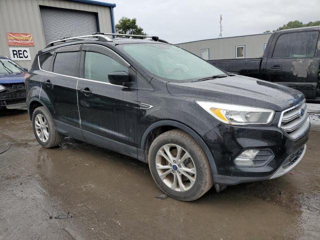Photo 4 from auction – 2017 FORD ESCAPE SE with VIN 1FMCU9GD9HUB35072