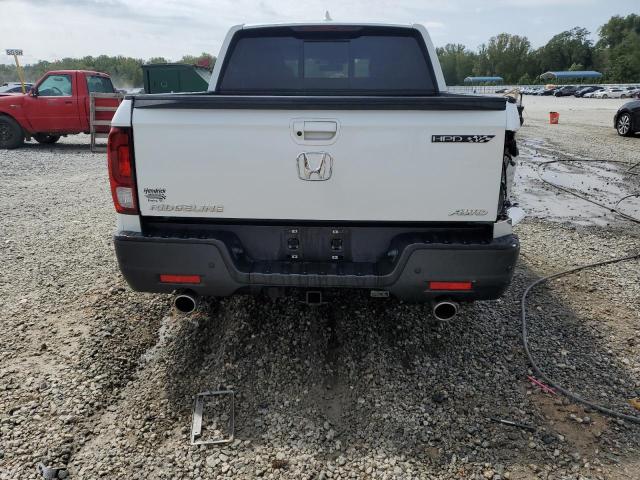 Photo 6 from auction – 2022 HONDA RIDGELINE with VIN 5FPYK3F74NB004975