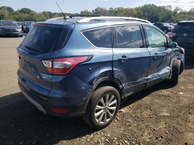 Photo 3 from auction – 2018 FORD ESCAPE TIT with VIN 1FMCU9J98JUC43855