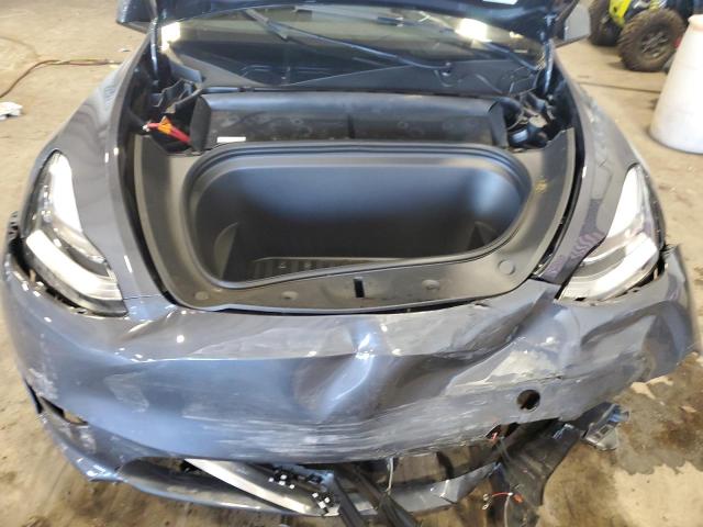 Photo 11 from auction – 2023 TESLA MODEL Y with VIN 7SAYGDEE3PA143997