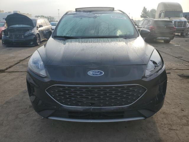 Photo 5 from auction – 2021 FORD ESCAPE SE with VIN 1FMCU9BZ7MUA12044