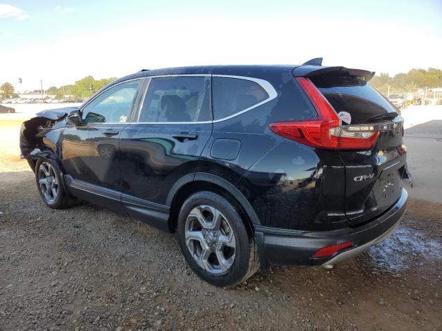 Photo 2 from auction – 2017 HONDA CRV with VIN 7FARW1H87HE017482