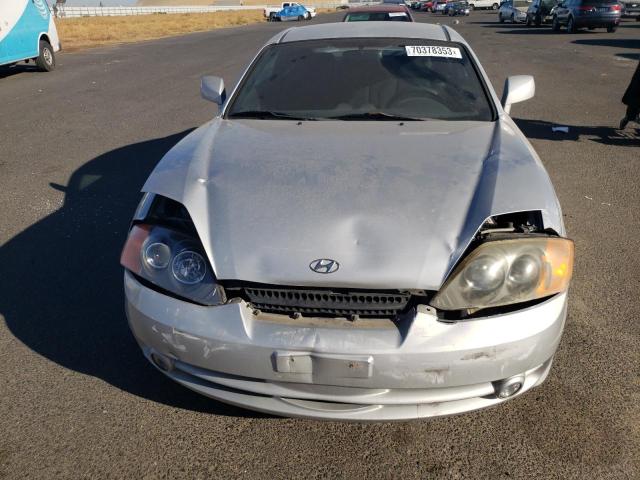 Photo 5 from auction – 2004 HYUNDAI TIBURON with VIN KMHHM65D54U150587